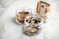 3 glass jars with Euro notes, 2Ã¢âÂ¬ coins and loose cash for housekeeping and savings Royalty Free Stock Photo